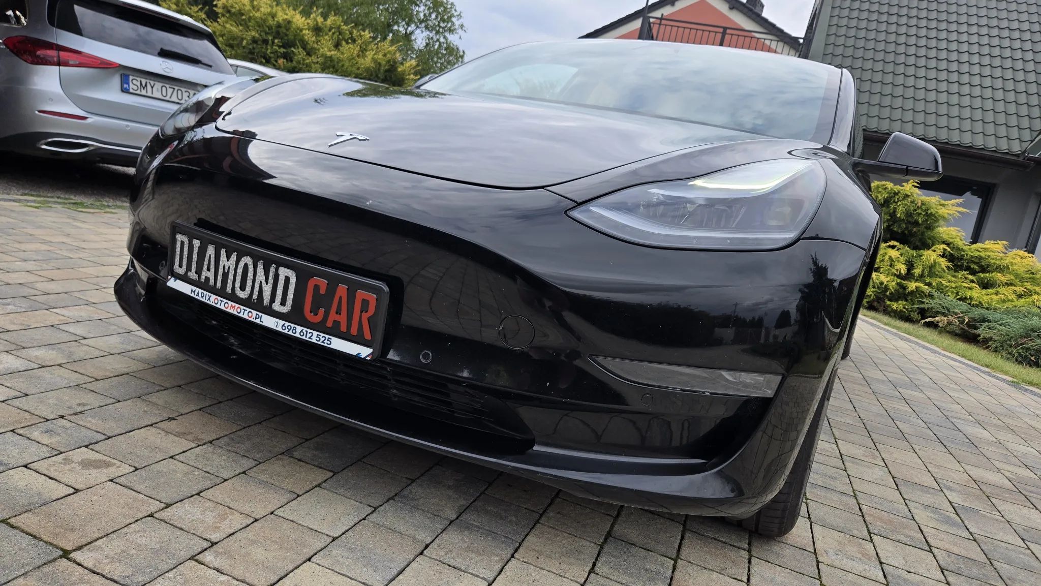 Tesla Model 3 2021 - bok